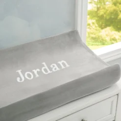 Delta Children Personalized Contoured Changing Pad With Plush Cover -Delta Children EM201270 5000 Changing Pad Embroidered Cover Lifestyle 102